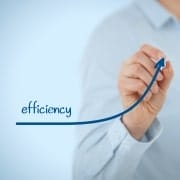 Person in white shirt drawing a graph in blue ink using the word efficiency - Evergreen Maintenance commercial cleaning and janitorial services.