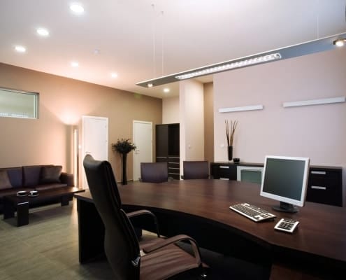 Office cleaning in board room with high end furniture