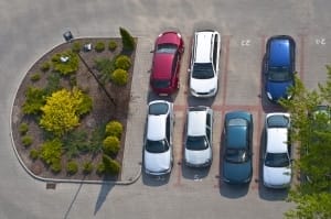 Parking lot cleaning services- top view of cars and green area