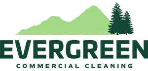 Logo for Evergreen Commercial Cleaning, featuring a silhouette of green mountains and evergreen trees above the company name in bold green text, representing excellence in property maintenance and commercial cleaning.