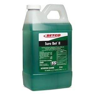 A plastic jug of Betco Sure Bet II bathroom cleaner with green liquid inside, featuring a green and white label with product details and instructions.