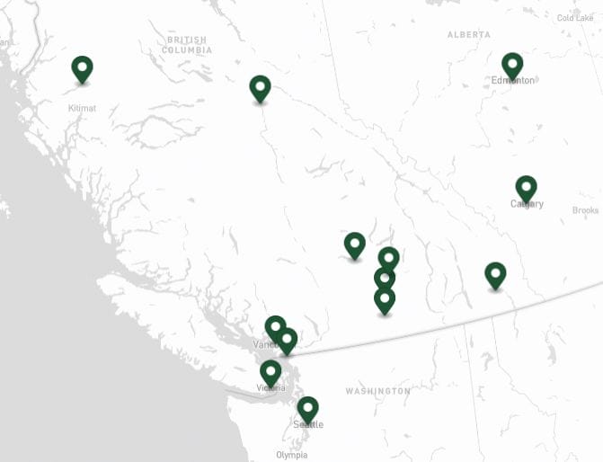 A map of western Canada and northwestern USA showing green location markers for Evergreen Building Maintenance around Vancouver, Victoria, Calgary, Edmonton, Kitimat, Seattle, and several nearby areas.